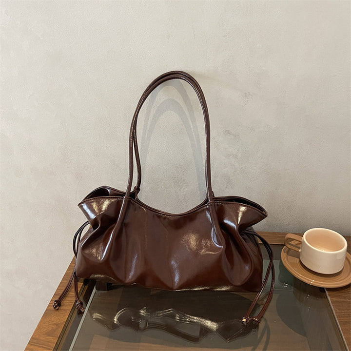 Glänzende Kunstleder-Handtasche