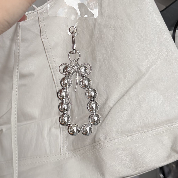 Eleganter Perlencharms-Schlüsselanhänger Karnz