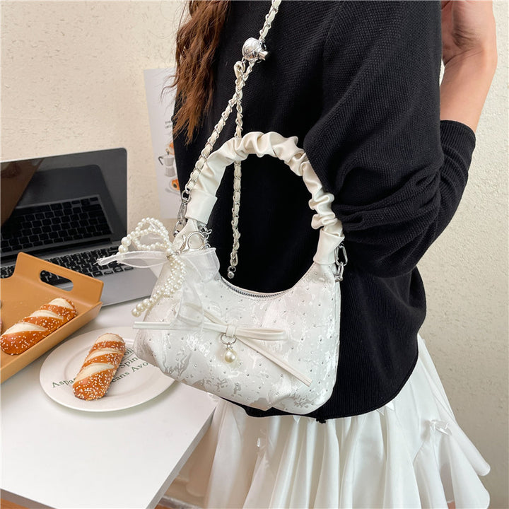 Elegante Schultertasche mit Schleifenverzierung