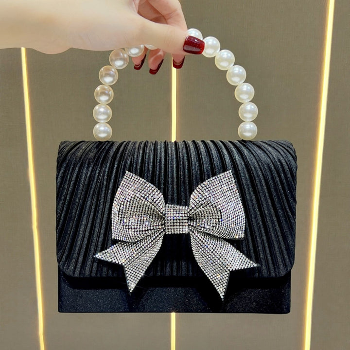 Elegante Abendtasche mit Schleifenverzierung