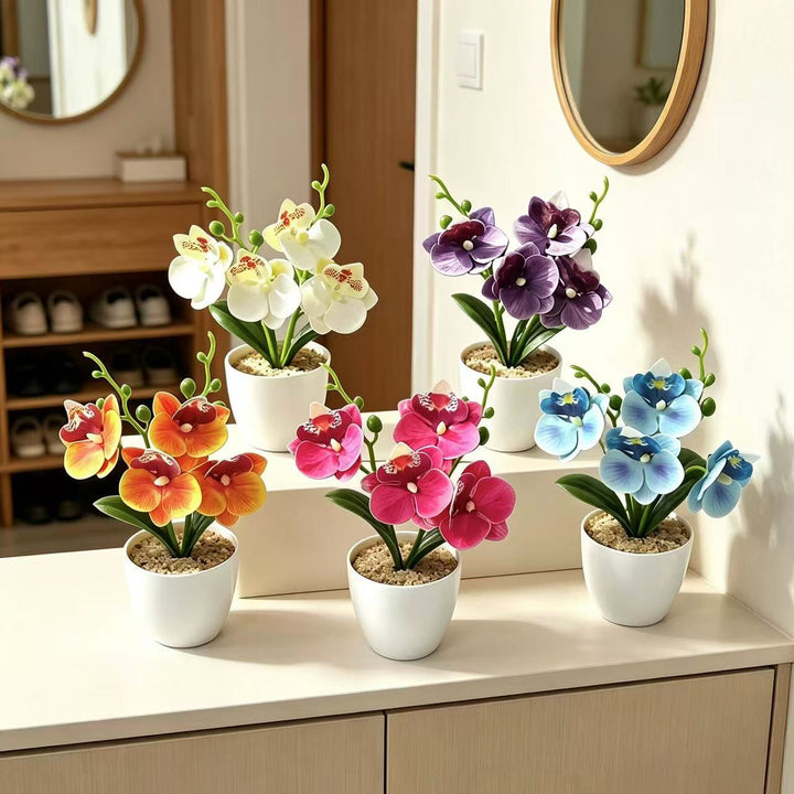 Elegante synthetische Orchideenarrangement
