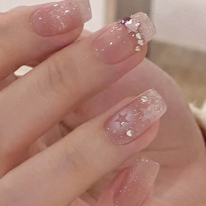 Kunstfingernägel mit Glitzernden Sternmotiven Karnz