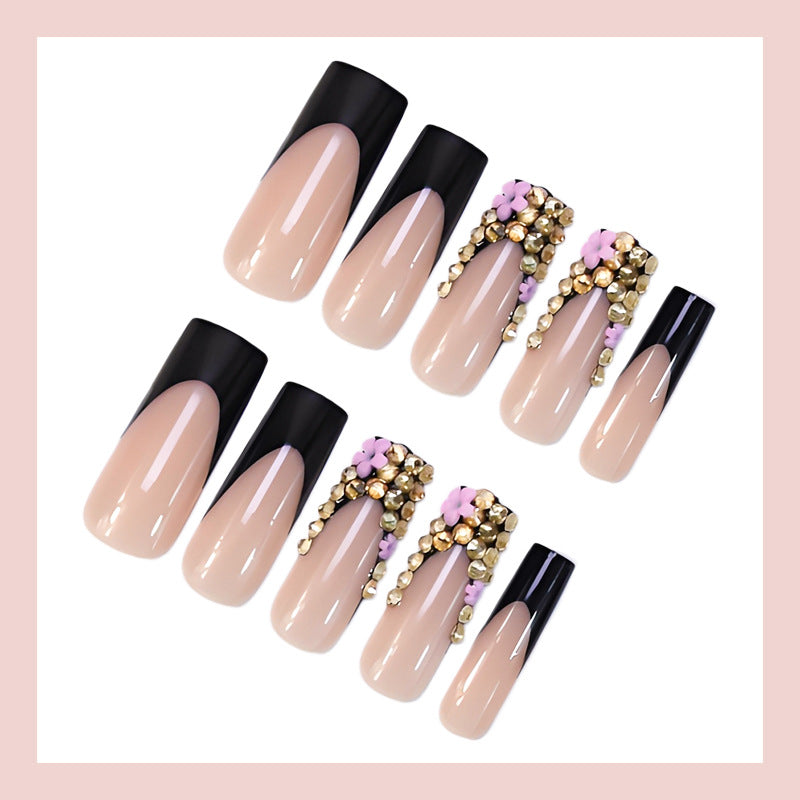 Kunstnagelset mit glamourösen Akzenten und modischem Design Karnz
