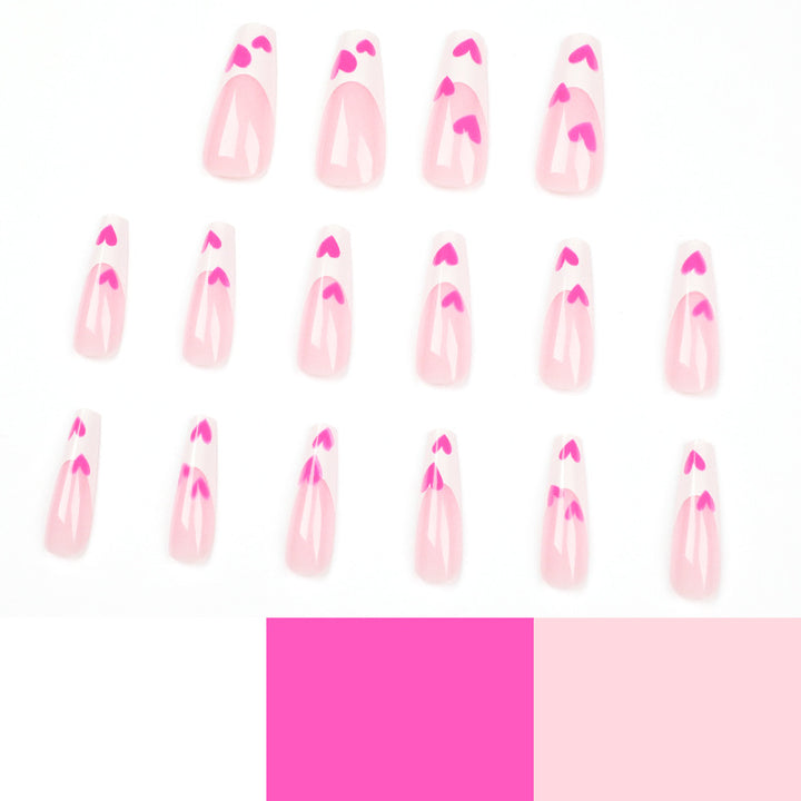 Kunstvolle Stiletto-Nägel mit Herzen-Design Karnz