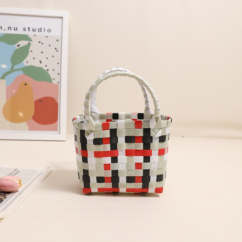 Damen Handtasche aus geflochtenem Kunststoff mit fröhlichem Muster Karnz