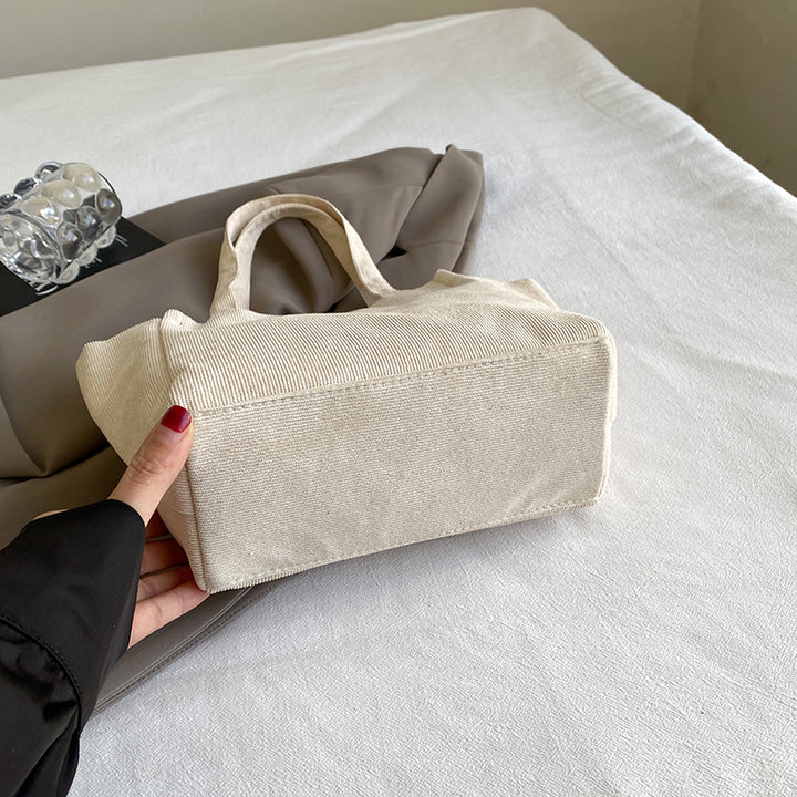 Texturierte Cordura-Tote-Tasche mit niedlichem Plüsch-Anhänger