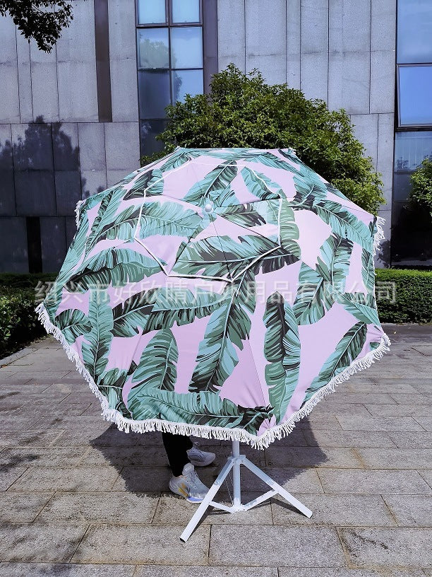 Damen Sonnenschirm mit tropischem Blattdesign und Quastenverzierung Karnz