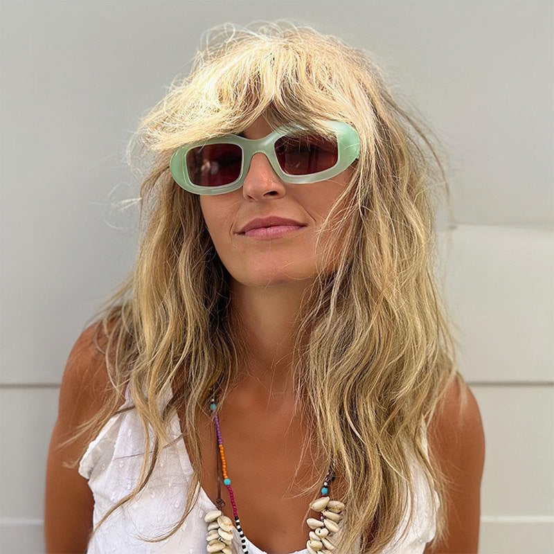 Damen Modische Sonnenbrille mit weichem, geschwungenem Rahmen Karnz