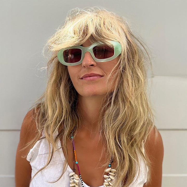 Damen Modische Sonnenbrille mit weichem, geschwungenem Rahmen Karnz