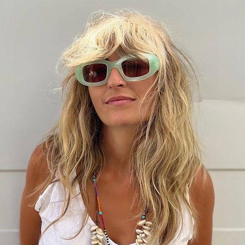 Damen Modische Sonnenbrille mit weichem, geschwungenem Rahmen Karnz