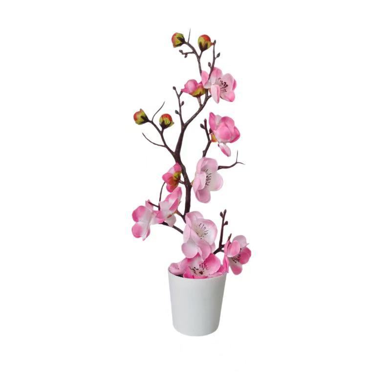 Lebensechte blühende künstliche Orchideenarrangement