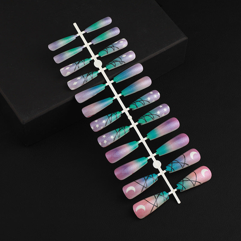 Kunstnägel mit Sternen- und Mond-Design Karnz