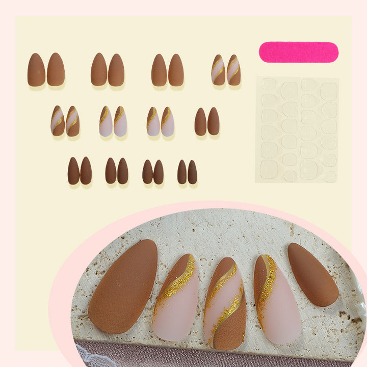 Elegantes Press-On Nagelset mit dekorativem goldenen Streifenmuster Karnz