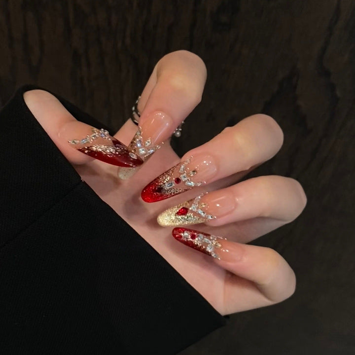 Dekoratives Stiletto Press-On Nagelset mit Edelsteinakzenten Karnz