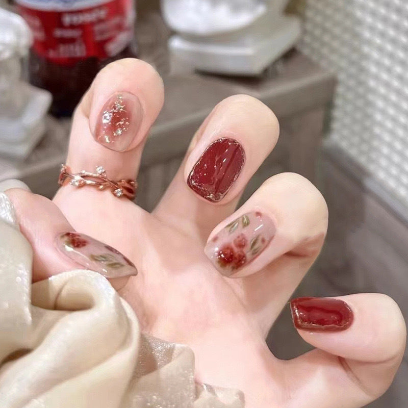 Floral-Design Press-On Nagelset mit Edelsteinakzenten