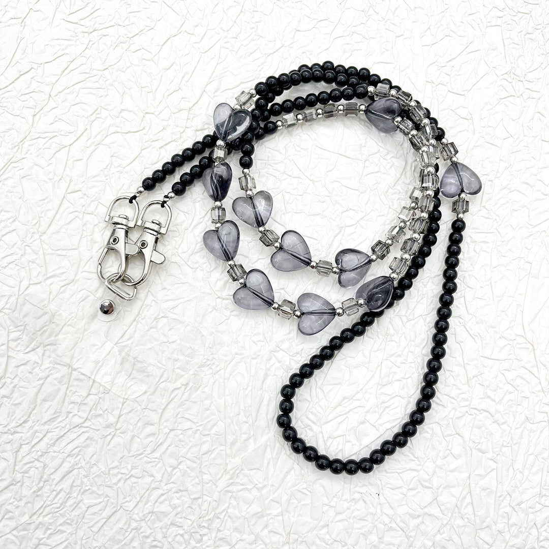 Perlen-Brillen-Kette mit stylischem Karomuster Karnz
