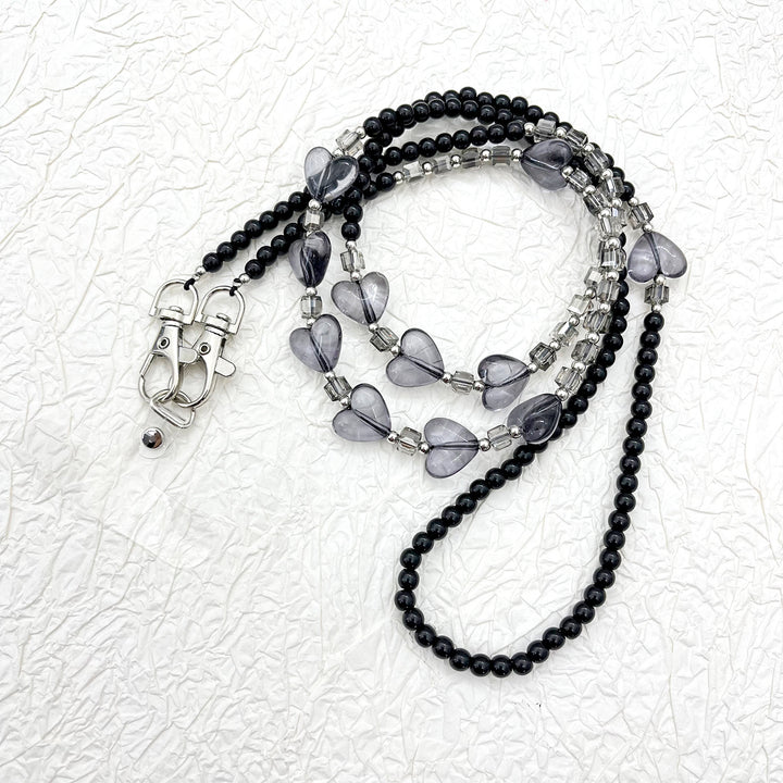 Perlen-Brillen-Kette mit stylischem Karomuster Karnz