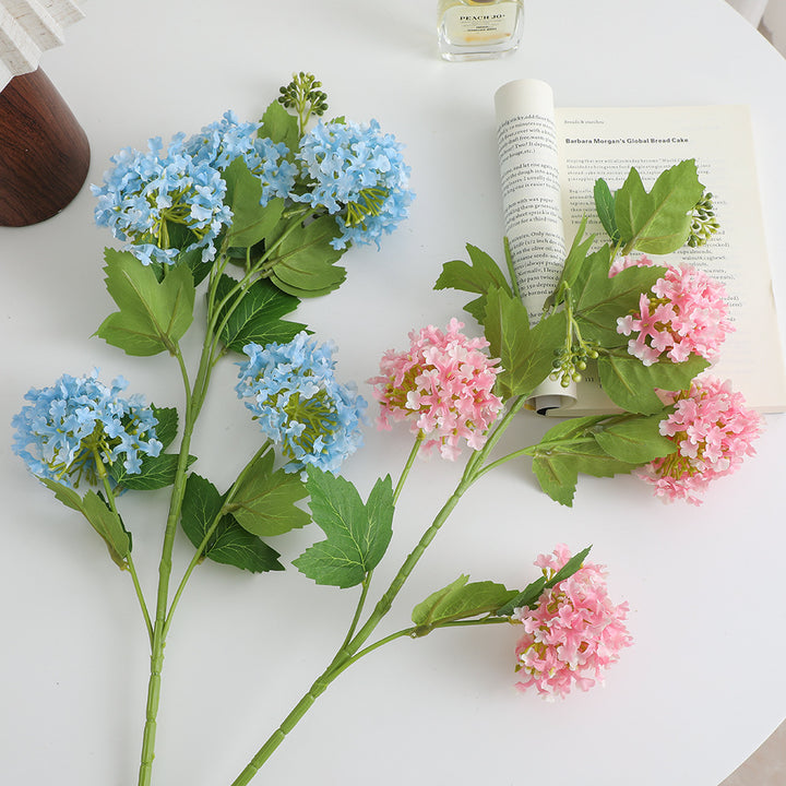 Künstlicher Hydrangeazweig mit lebhaften Blüten und detailreichen Blättern Karnz