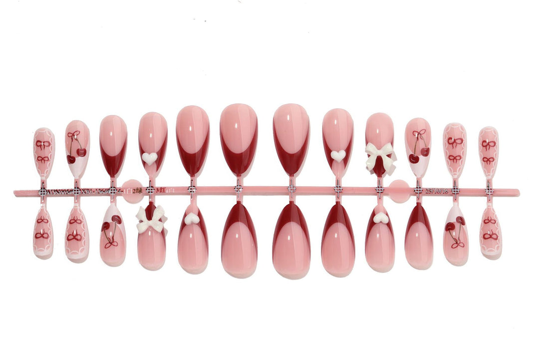 Dekorativer Druck-Nagel-Set mit charmanten Kirsch- und Schleifen-Designs Karnz