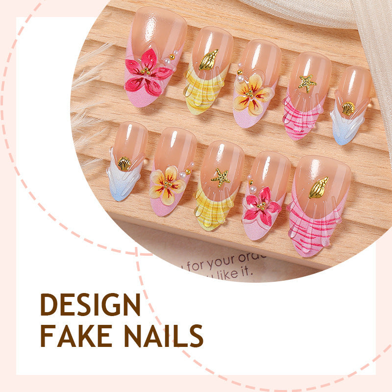 Kunstnagelset mit farbenfrohen Blütenmotiven und Glitzerdetails Karnz