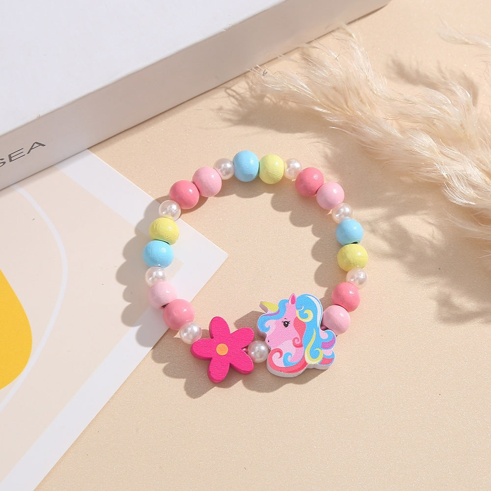 Verspieltes Kinderarmband mit Einhorn- und Blumenmotiv Karnz
