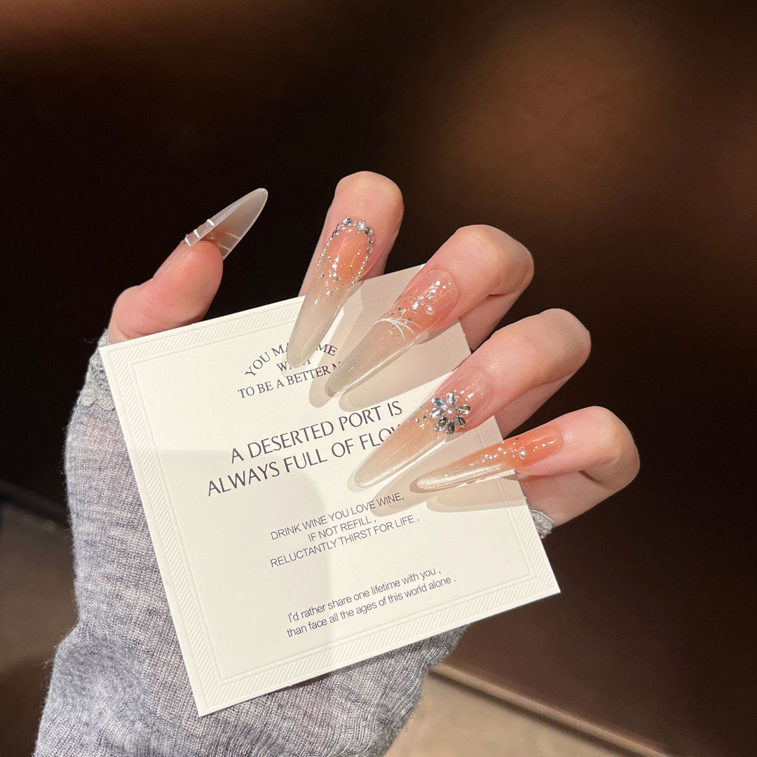 Elegante Stiletto Press-On Nagelverlängerungen mit Strass Karnz
