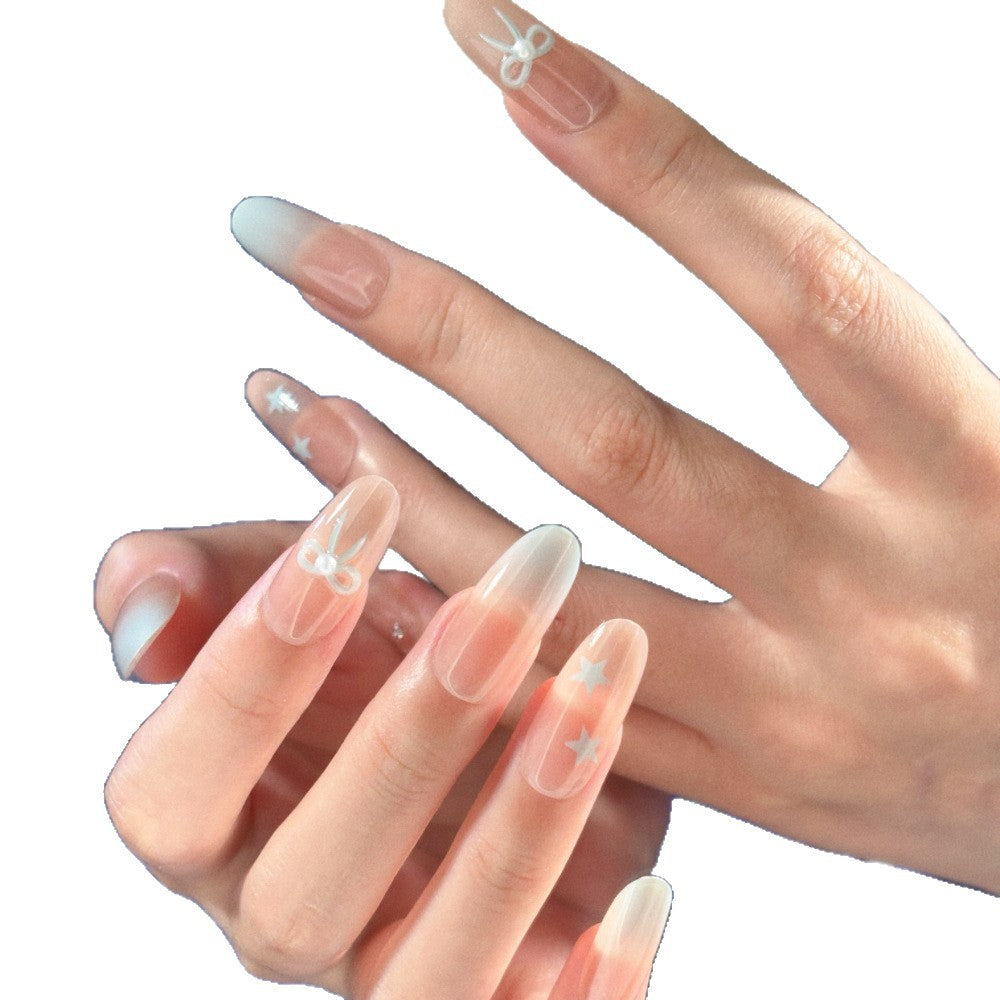 Glamouröse Ombre Press-On Nagelset mit dekorativen Stern- und Schleifenakzenten Karnz