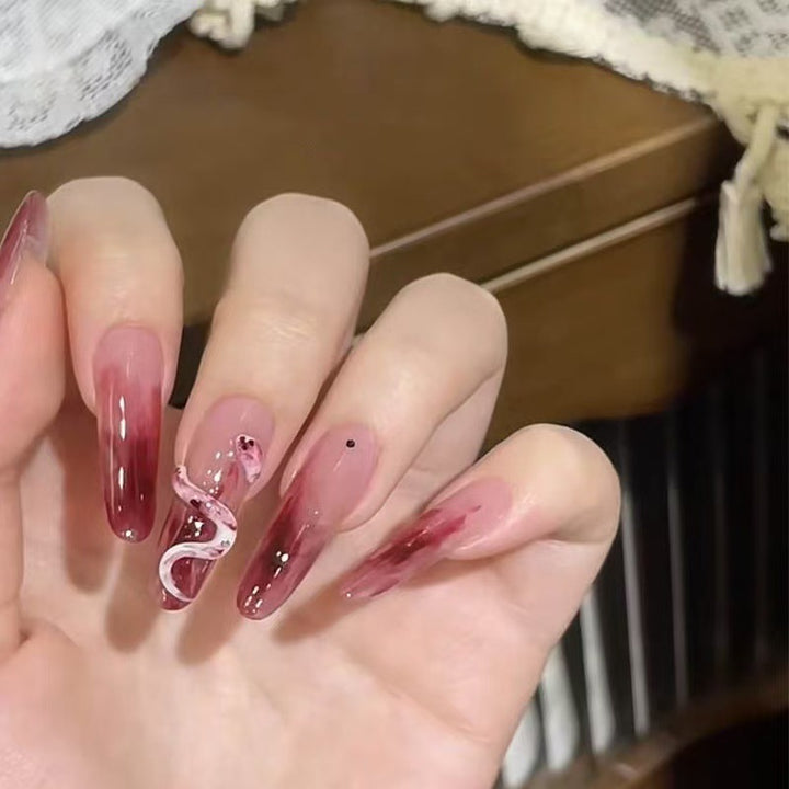 Künstlerische lange Stiletto-Nagelerweiterungen