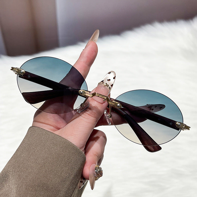 Damen modische und elegante Sonnenbrille mit ovalem Design Karnz