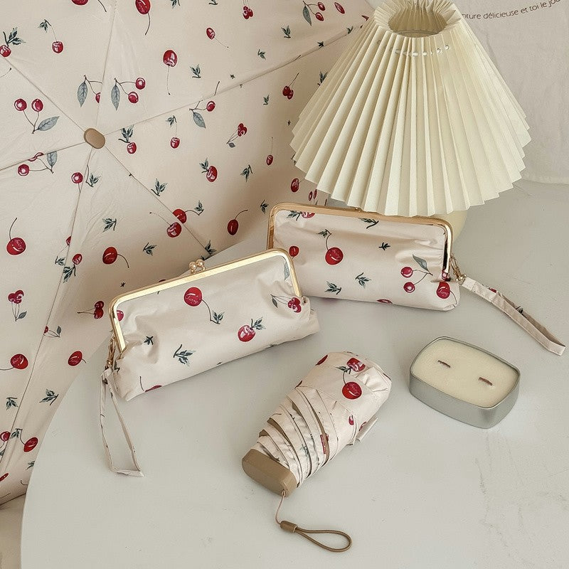 Damen eleganter Faltregenschirm mit floralem Design und praktischem Etui Karnz