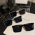Damen quadratische Sonnenbrille mit modernem, robustem Kunststoffrahmen Karnz
