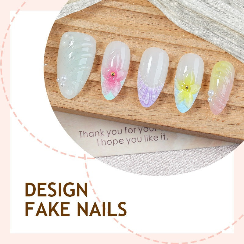 Kunstnagelset mit bunten floralem Design und Glitzerakzenten Karnz