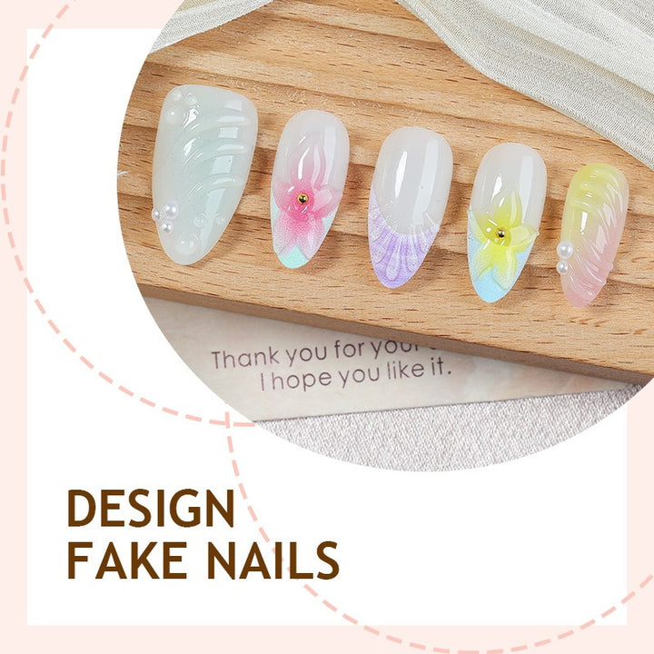 Kunstnagelset mit bunten floralem Design und Glitzerakzenten Karnz