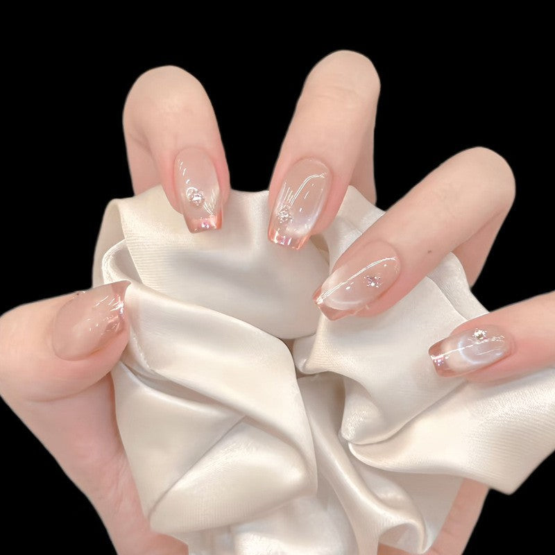 Dekorativer Press-On Nagelset mit Glitter und Strassakzenten Karnz