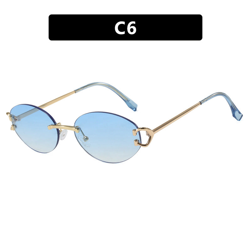 Damen elegante ovalförmige Sonnenbrille mit modischem Metallrahmen Karnz