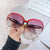 Damen oversized Sonnenbrille mit glamourösem Design Karnz