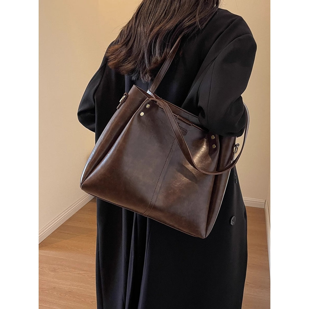 Vielseitige multifunktionale Handtasche Karnz