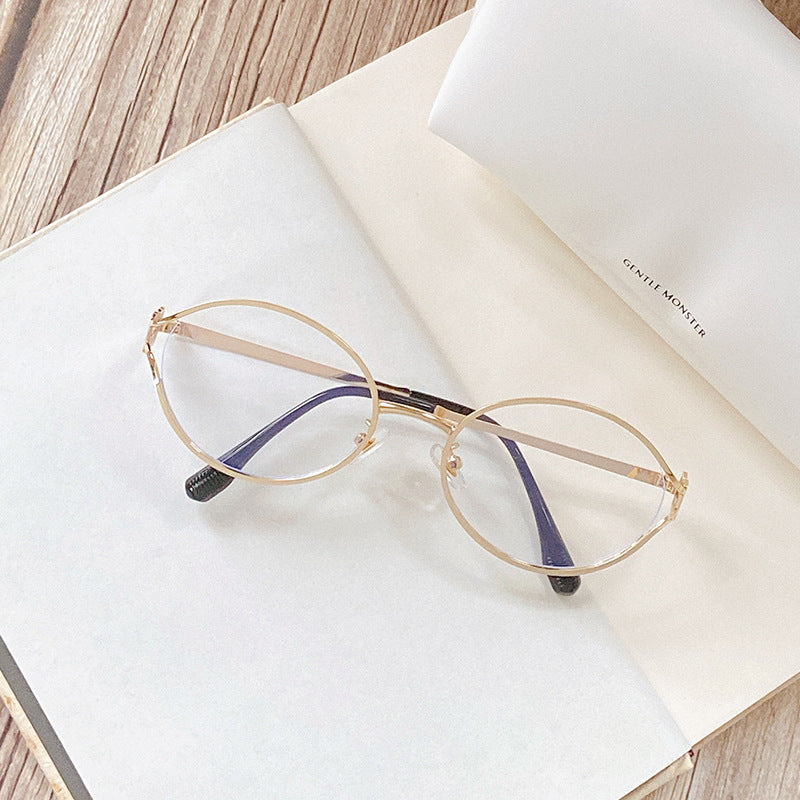 Runde Sonnenbrille mit Goldenen Akzenten Karnz