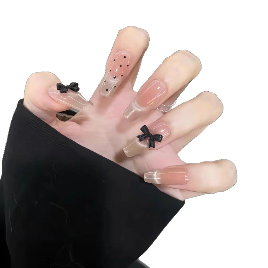 Dekorativer Press-On Nagelset mit einzigartigen Schleifenakzenten Karnz