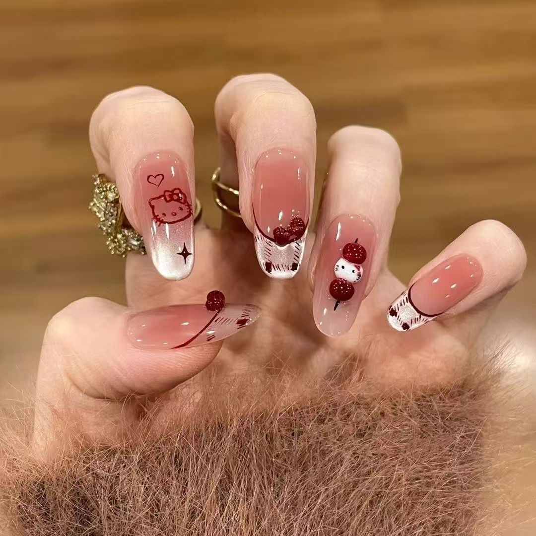 Niedliche themenbezogene Press-On Nagelkunst