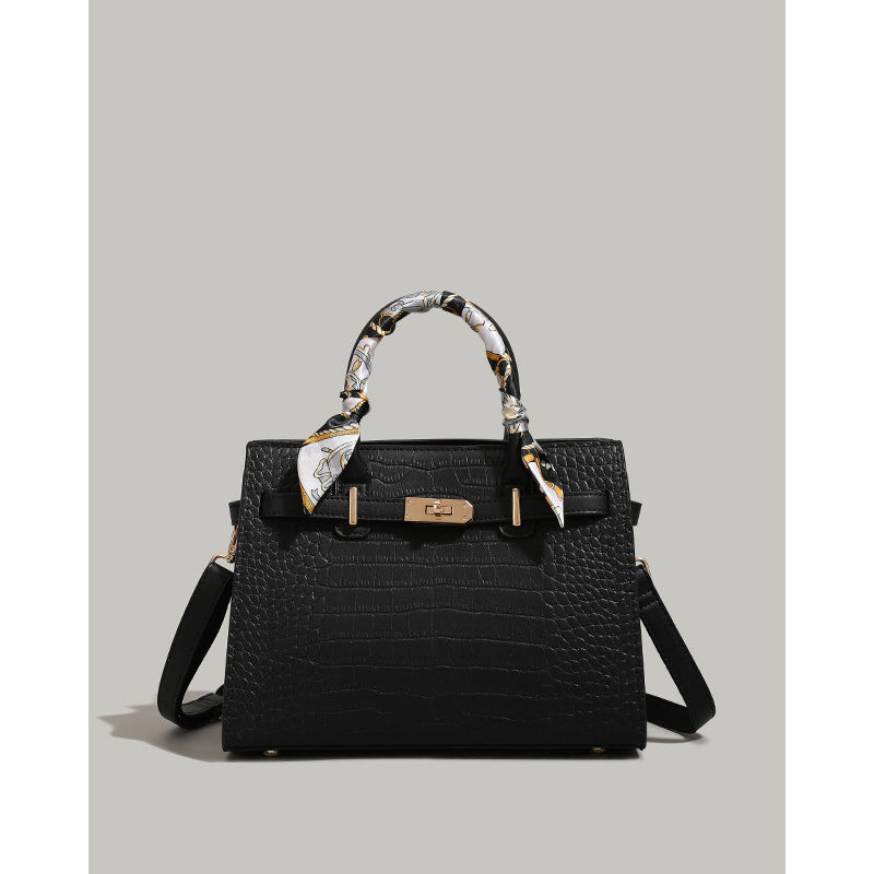 Strukturierte Krokodil-Muster-Handtasche Karnz