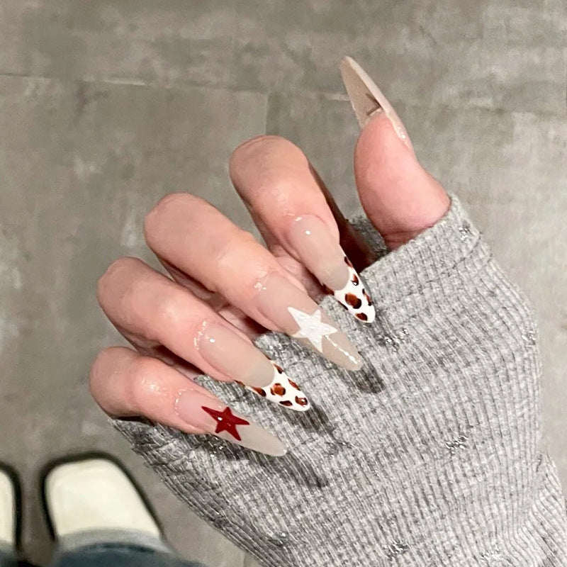 Künstlerische Stiletto Press-On Nägel mit Stern- und Tiermustern Karnz