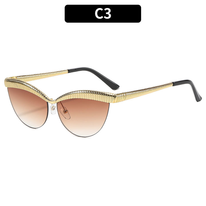 Elegante Katzenauge-Sonnenbrille mit metallischen Akzenten