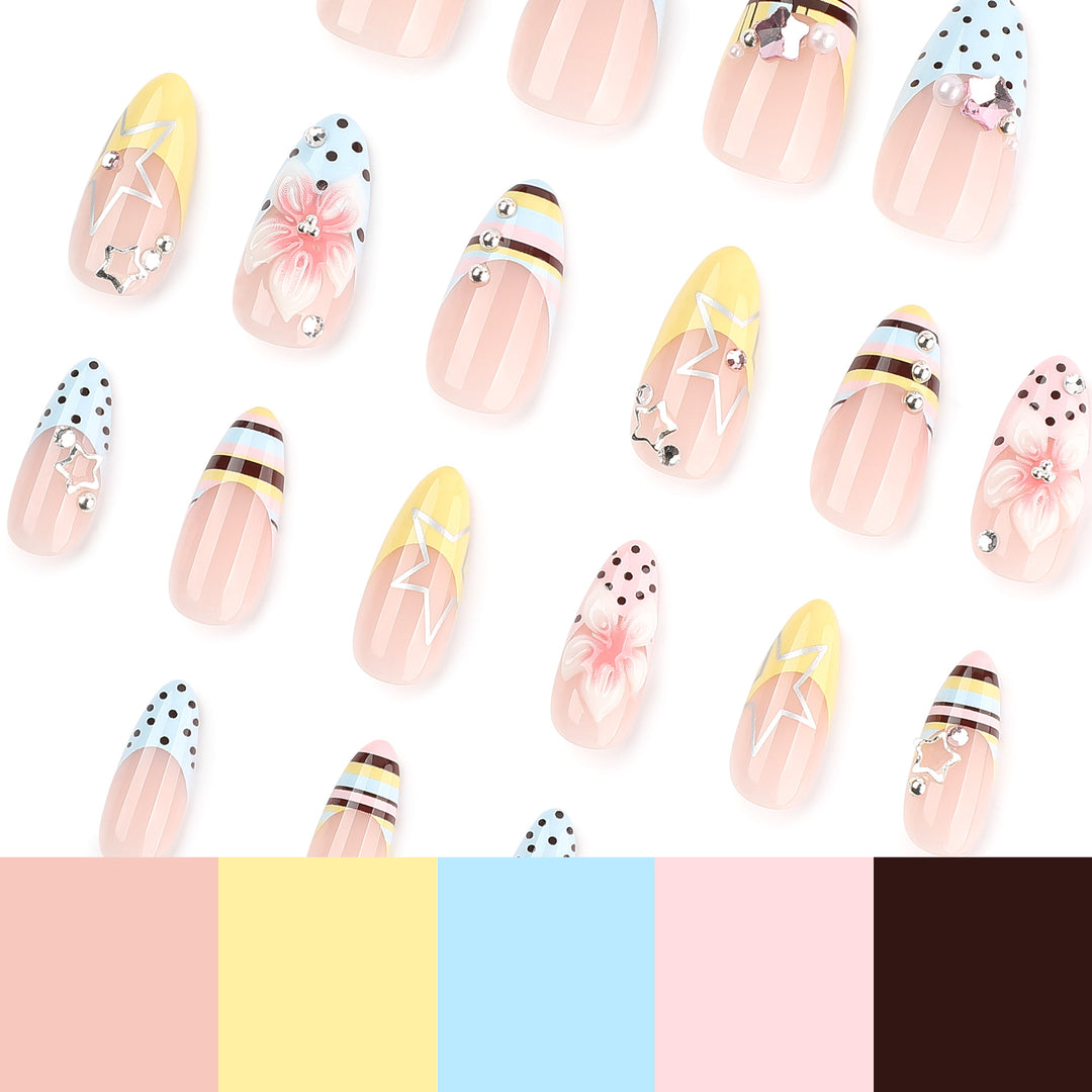 Kreative Nageldesigns mit floralem Akzent und Glitzer Karnz