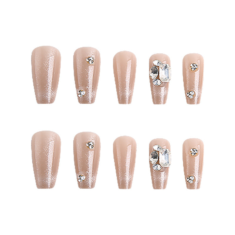 Kunstnagelset mit glamourösen Glitzerakzenten und eleganten Schmuckverzierungen Karnz