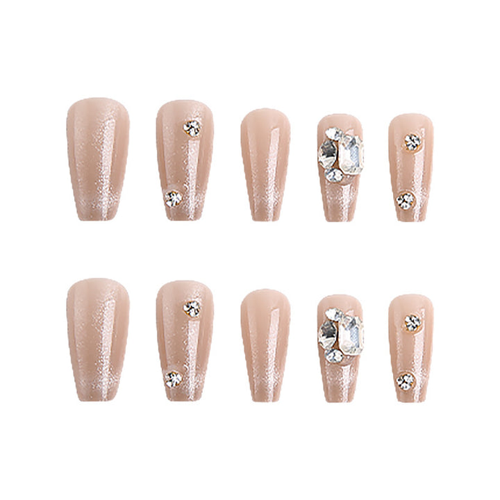 Kunstnagelset mit glamourösen Glitzerakzenten und eleganten Schmuckverzierungen Karnz