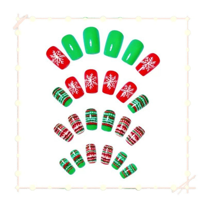 Festliche Kunstnägel mit Weihnachtsmotiven Karnz