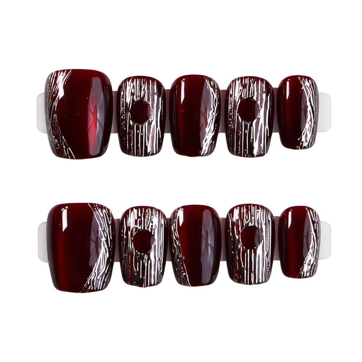 Chic mandelförmiges Press-On-Nagelset mit eleganten silbernen Akzenten Karnz