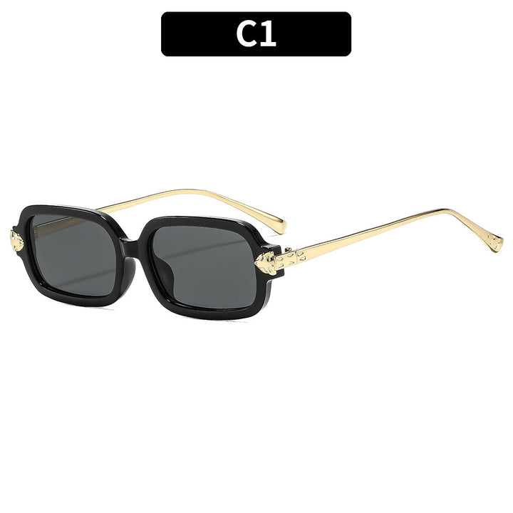 Hochwertige winkelige Sonnenbrille mit goldenen Akzenten