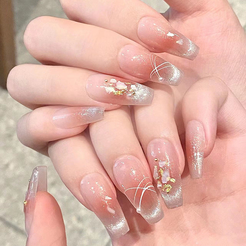 Künstlerisches Press-On-Nagelset mit glitzernden Sternakzenten Karnz